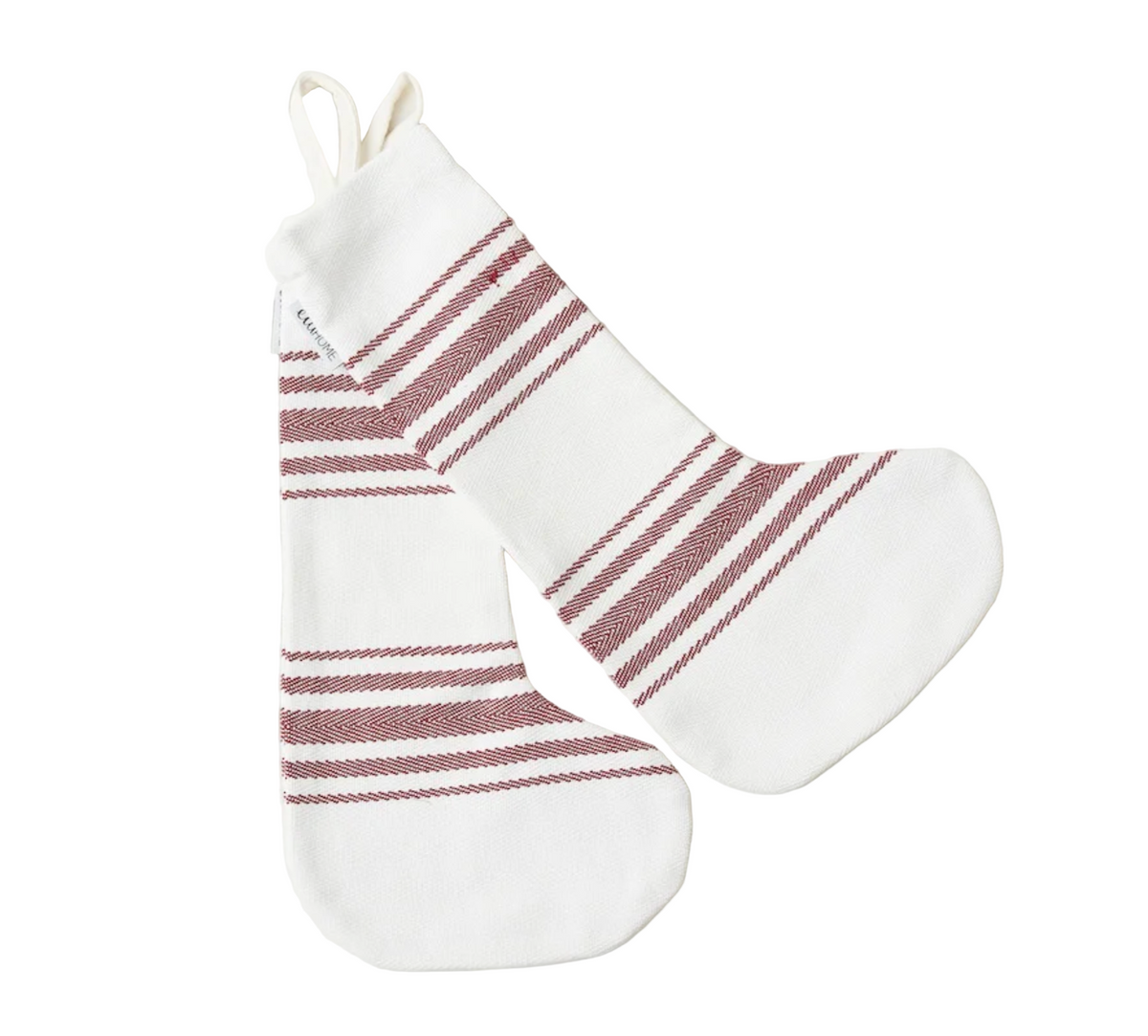 White Christmas stocking with red stripes on a white marble background