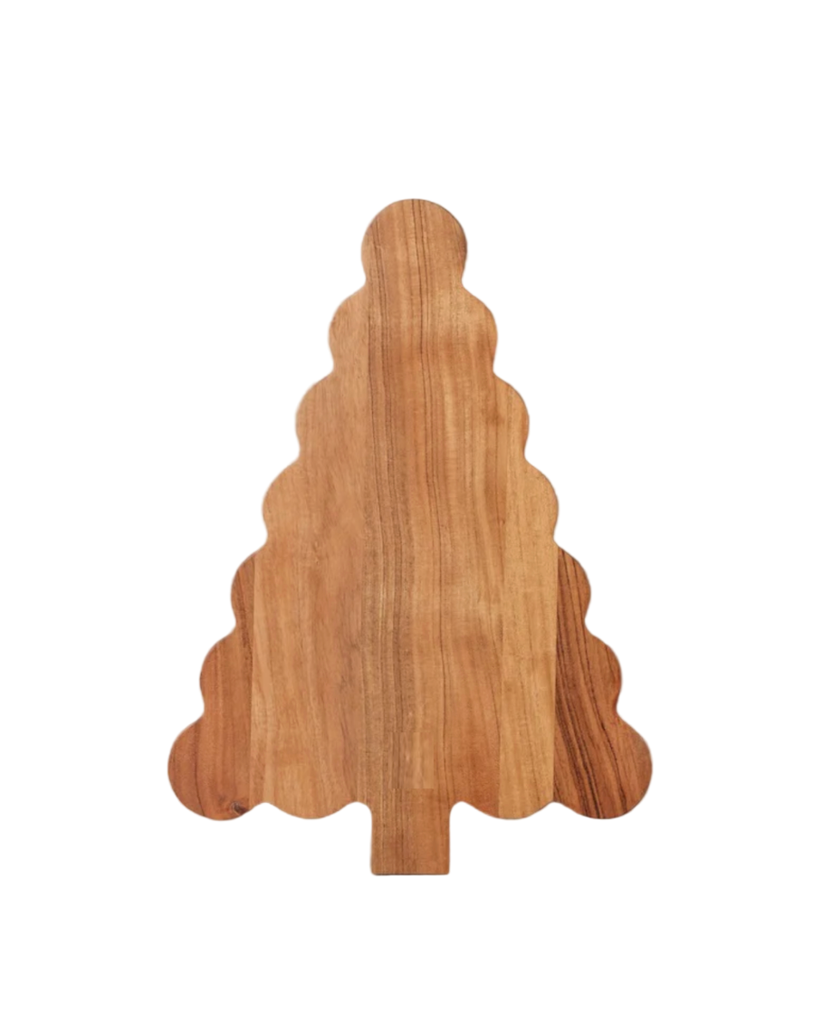 Wooden cutting board shaped like a Christmas tree on a white background