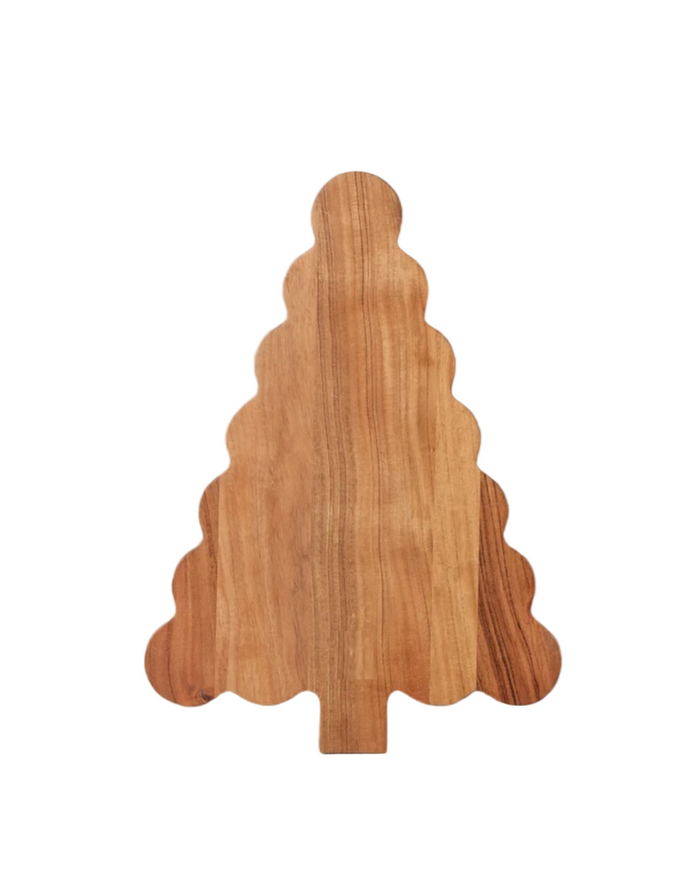 Wooden cutting board shaped like a Christmas tree on a white background