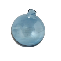 Blue glass vase on a white background