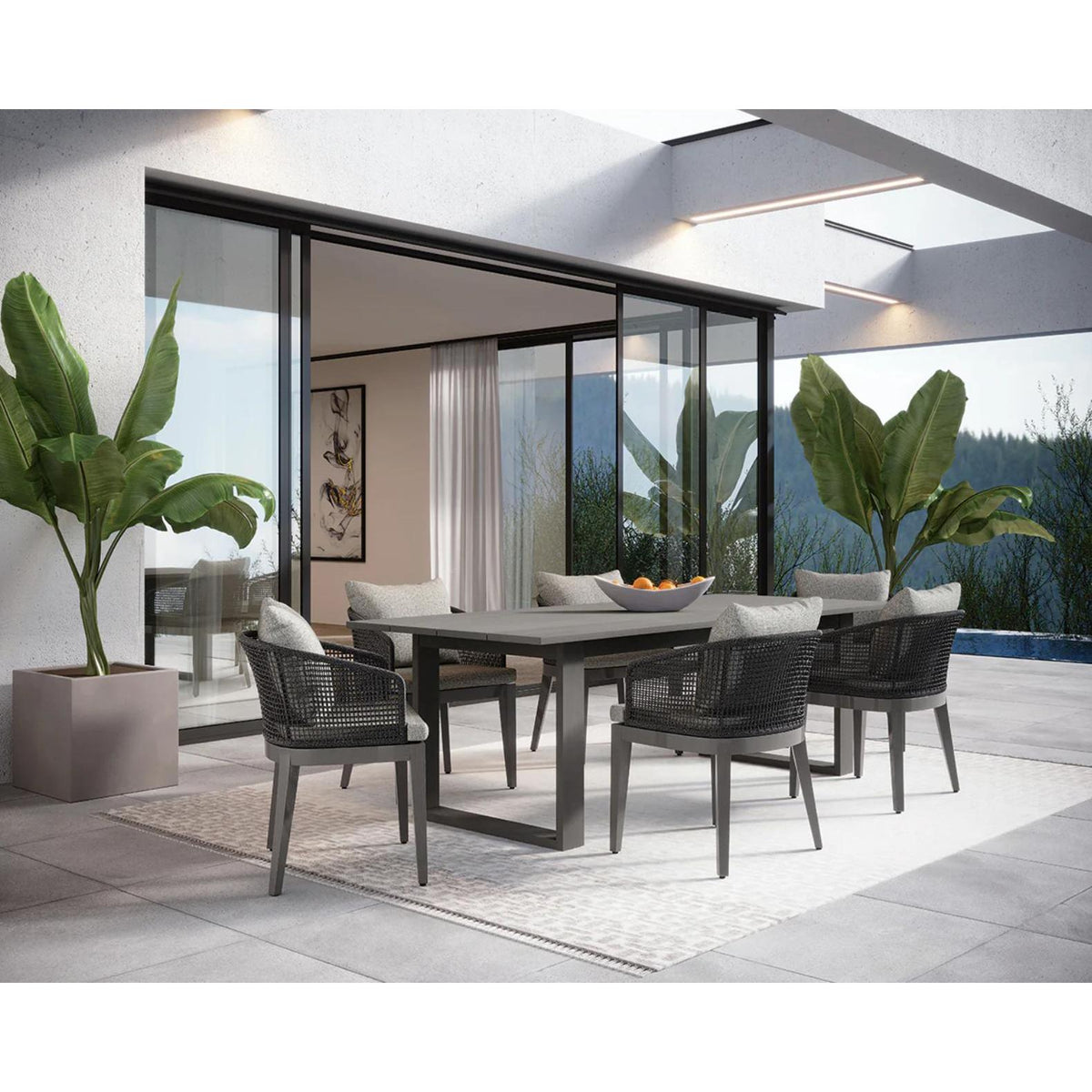 Capri Charcoal Grey Woven Dining Armchair - Outdoor Dining Chair Side View | Bone & Brass