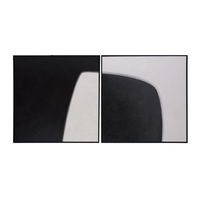 A two-panel abstract wall art set featuring minimalist black and white geometric shapes, displayed side-by-side on a plain white background.