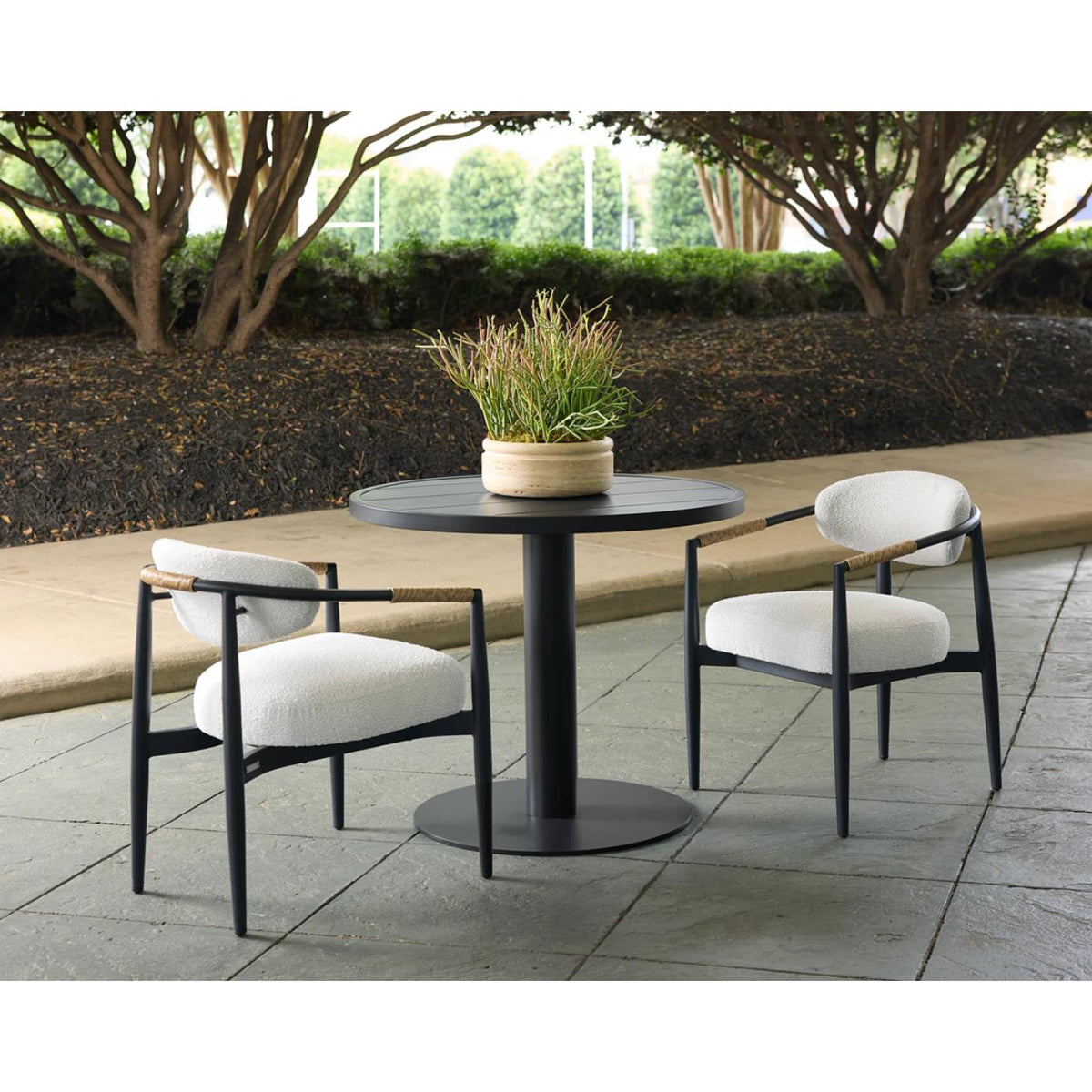 Marita Outdoor Dining Armchair - Black - Louis Cream - Outdoor Dining Chair Side View | Bone & Brass