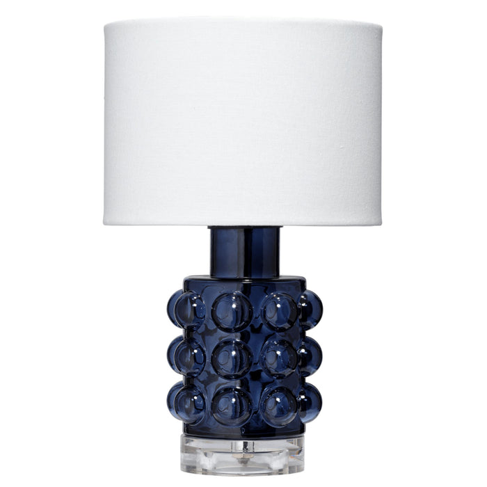 Cobalt blue glass Seltzer Mini Table Lamp with textured bubbles, clear base, and off-white linen drum shade.