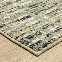 Seneca Beige & Green Casual Rug with modern abstract pattern, dense polypropylene pile, and woven edge.