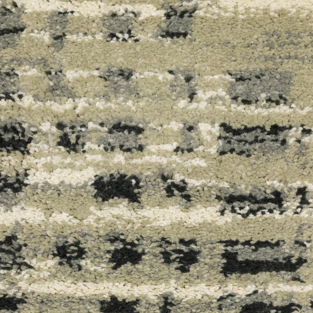 Close-up of Seneca Beige & Grey Casual Rug, showing dense polypropylene pile with abstract black, ivory, and grey patterns.