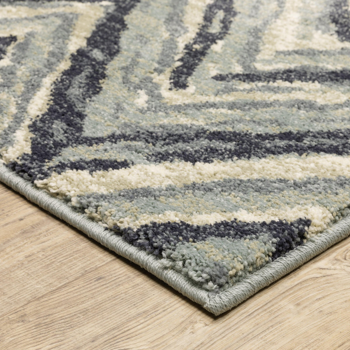 Seneca Blue & Ivory Chevron Rug, dense high-pile polypropylene with modern gray, blue, and ivory design.