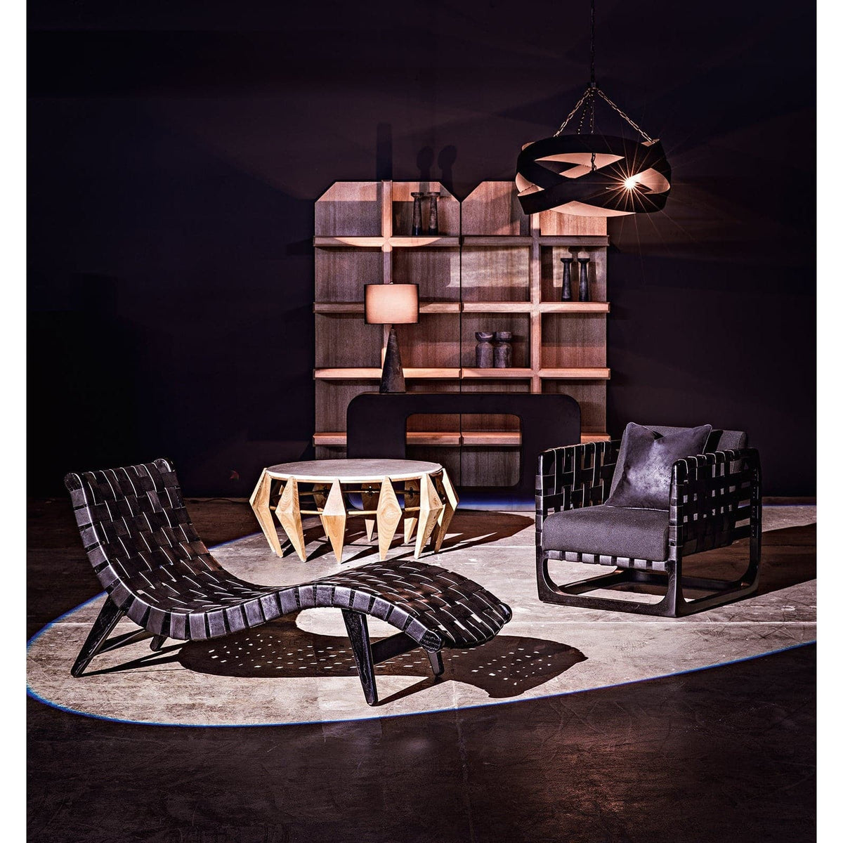 Black steel Shylock console with rounded rectangular top and solid ovoid base, 30"H x 60"W x 15"D.