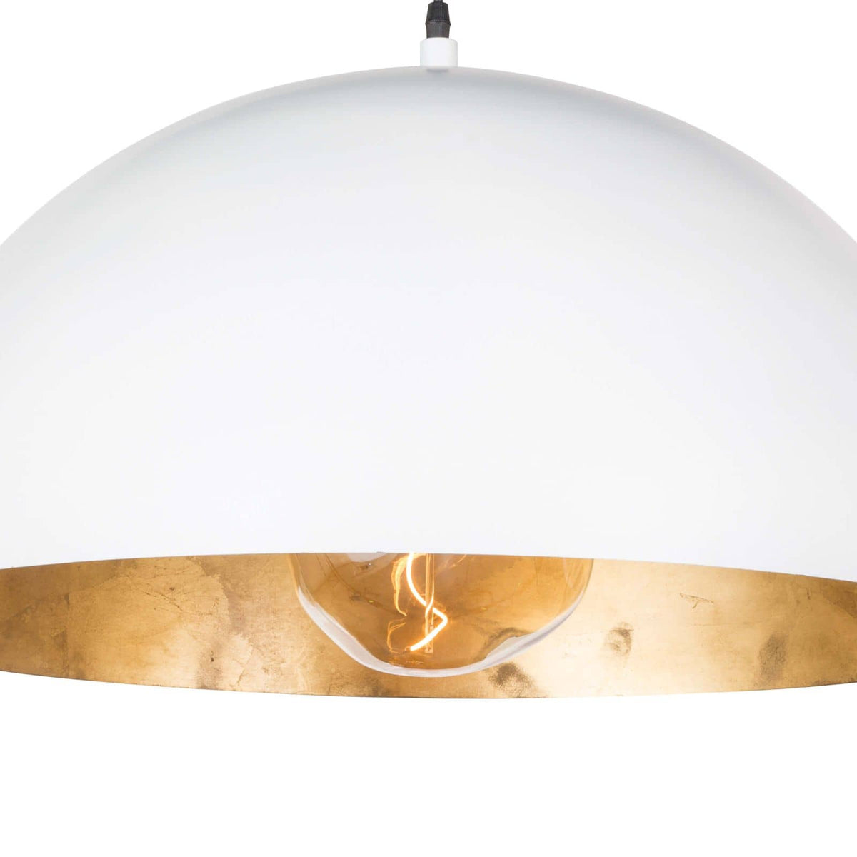 Large white dome pendant light with a gold-leafed interior and exposed bulb.