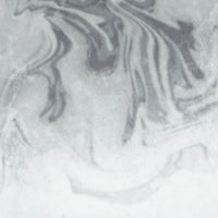 Silver Haze Swirl Throw Pillow with a luxurious gray and white marbled polyester fabric.