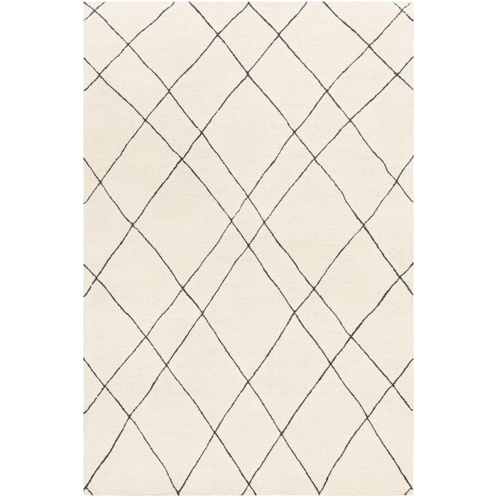 Sinop cream and black hand-tufted wool rug with a globally inspired diamond pattern.