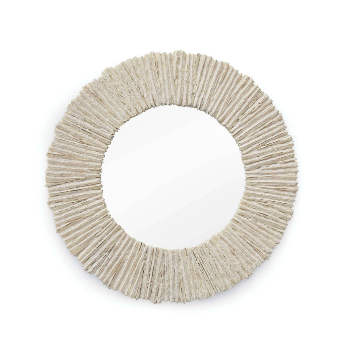 Round mirror with a textured, natural beige, slate-inspired frame.