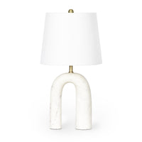 Slinkly Marble Table Lamp with a unique arched solid marble base, white linen shade, and polished brass accents.