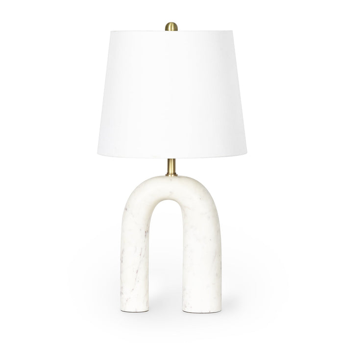 Slinkly Marble Table Lamp with a unique arched solid marble base, white linen shade, and polished brass accents.
