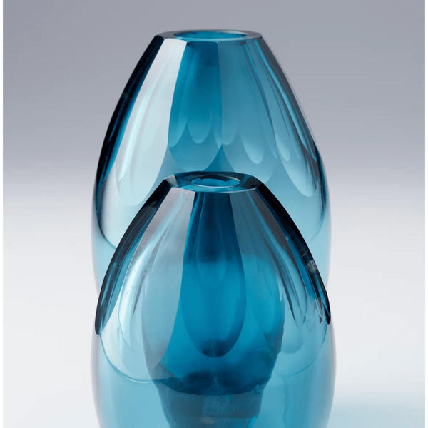 Small ocean blue handcrafted glass vase with elegant design, ideal for luxury home décor.