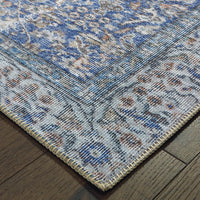 Sofia Blue Casual Rug with antique-inspired traditional patterns, machine-woven polyester chenille, and blanket stitch edge.