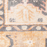 Close-up of a Sofia Gold & Charcoal Traditional Rug with distressed pattern, polyester chenille.