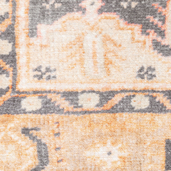 Close-up of a Sofia Gold & Charcoal Traditional Rug with distressed pattern, polyester chenille.