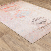 Sofia Pink Distressed Traditional Rug, a vintage-inspired polyester chenille rug with intricate blanket stitch.
