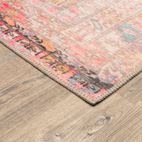 Sofia Pink Distressed Traditional Rug with vintage-inspired design, intricate blanket stitch, and polyester chenille texture.