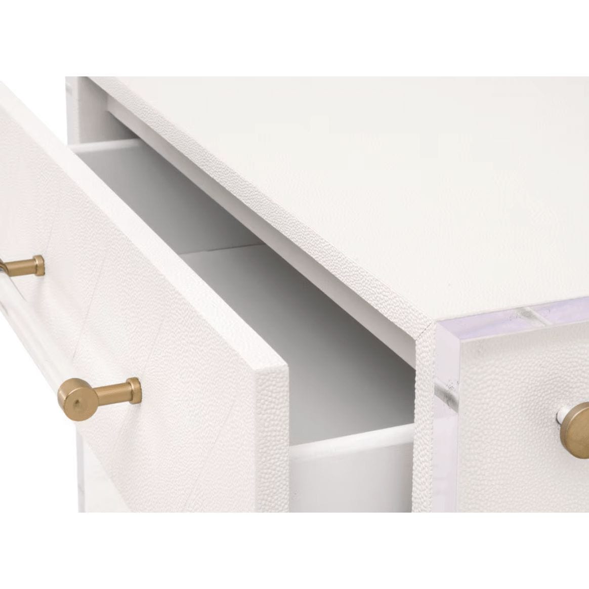 White shagreen and Lucite nightstand with a partially open drawer, brass pulls.