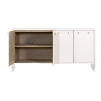Pearl white faux shagreen media sideboard with clear acrylic and brushed brass accents, one door open revealing shelves.