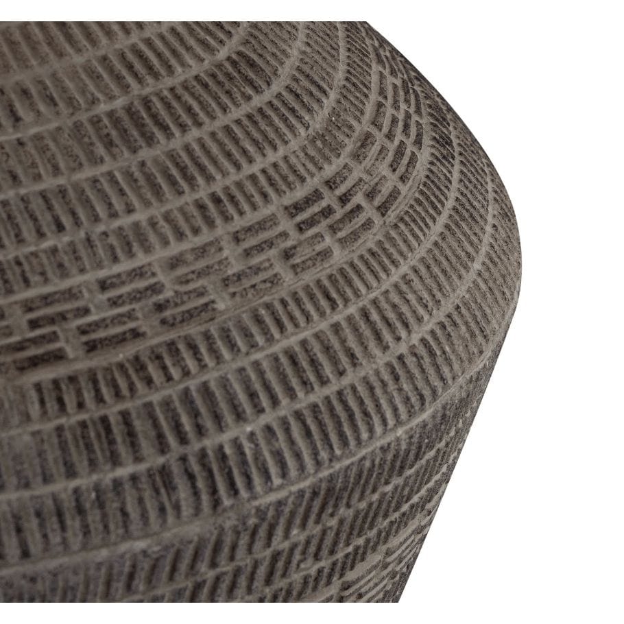 Close-up of the Soren Ceramic Table Lamp base, showing its dark gray earthenware look and unique etched pattern.