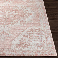 St Tropez pale pink and beige traditional polypropylene rug with intricate floral patterns.
