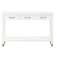 Stella matte white narrow console table with three drawers, gold pulls, and a bottom shelf.