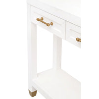 Stella matte white narrow console table with three drawers, gold pulls, and a bottom shelf.