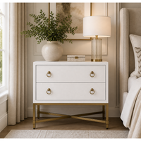 Pearl white faux shagreen 2-drawer nightstand with brushed gold ring pulls and an X-design steel base.