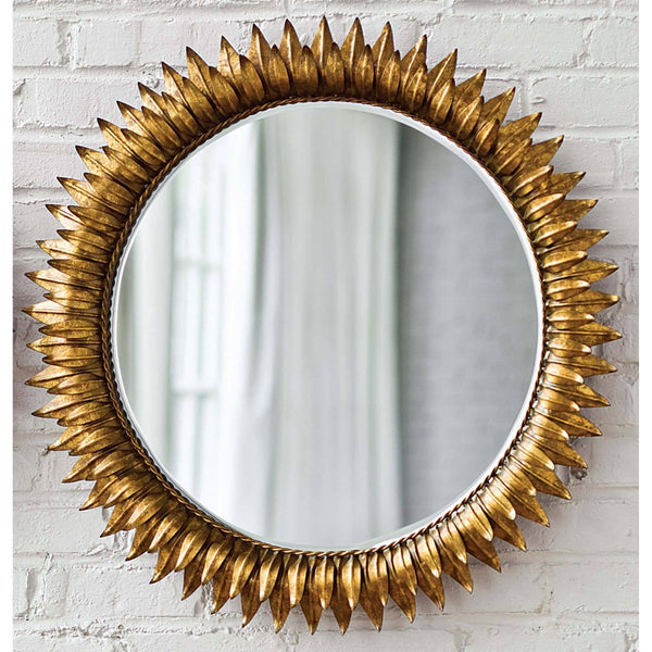 Antique gold leaf sunburst mirror with a beveled round mirror, 29" diameter.