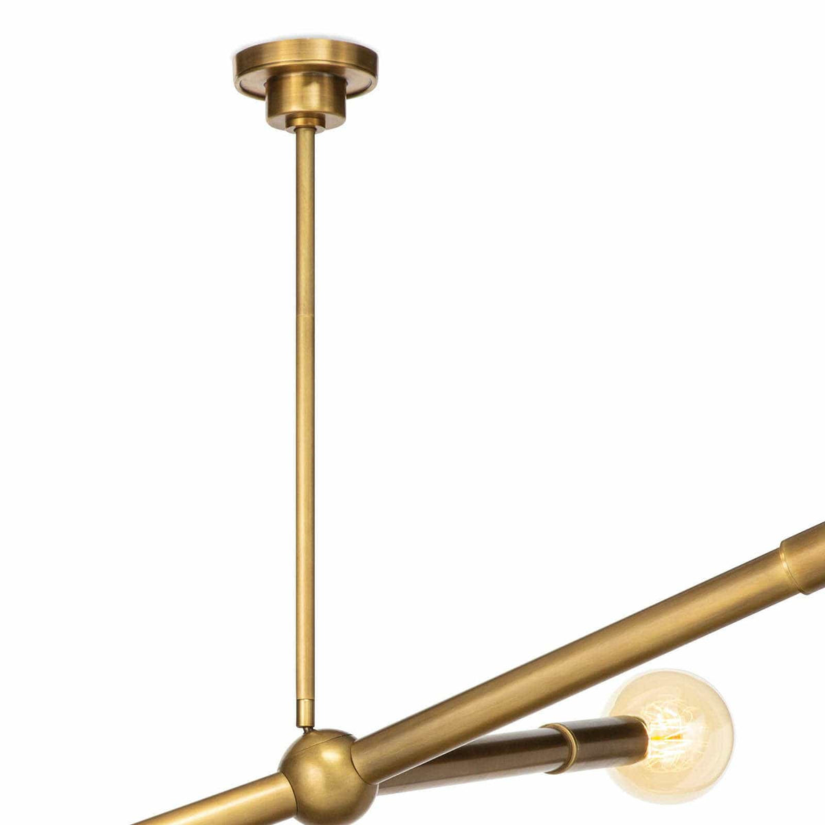 Modern Talon Chandelier in natural brass with adjustable arms and exposed G-type bulbs.