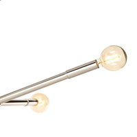 Talon Chandelier with polished nickel arms and exposed G-type bulbs, angled up and down.