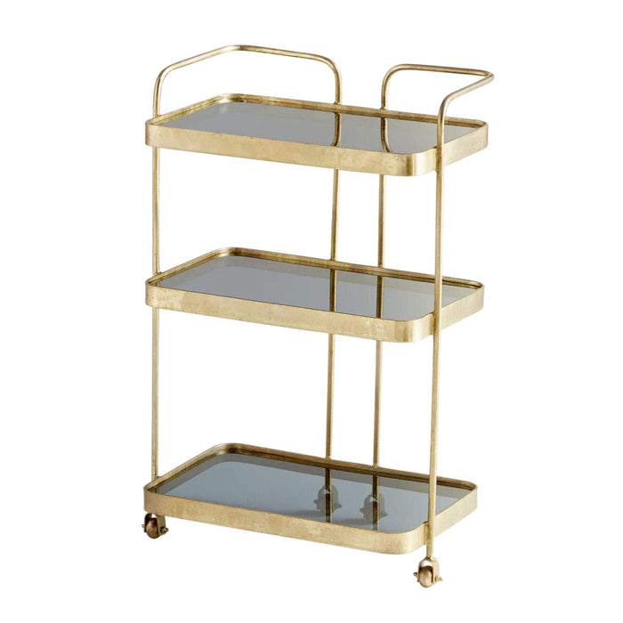 Tanner Antique Brass Bar Cart with three glass shelves and mid-century iron design.