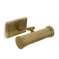 Small natural brass Tate picture light with a rectangular base and cylindrical shade.