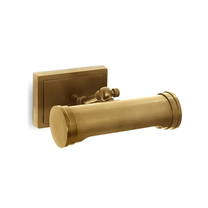 Small Tate picture light in natural brass with a rectangular base and cylindrical shade.