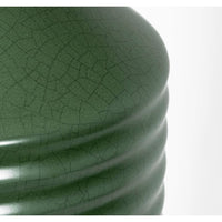 Close-up of a Temperance olive green ceramic table lamp base with ribbed texture and matte crackle glaze.