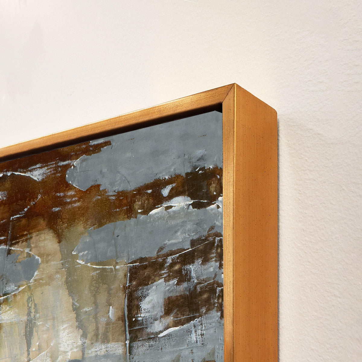 Abstract giclee canvas painting with textured brushstrokes in gray, brown, and white, framed in gold.