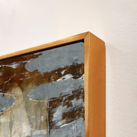 Abstract giclee canvas painting with textured brushstrokes in gray, brown, and white, framed in gold.