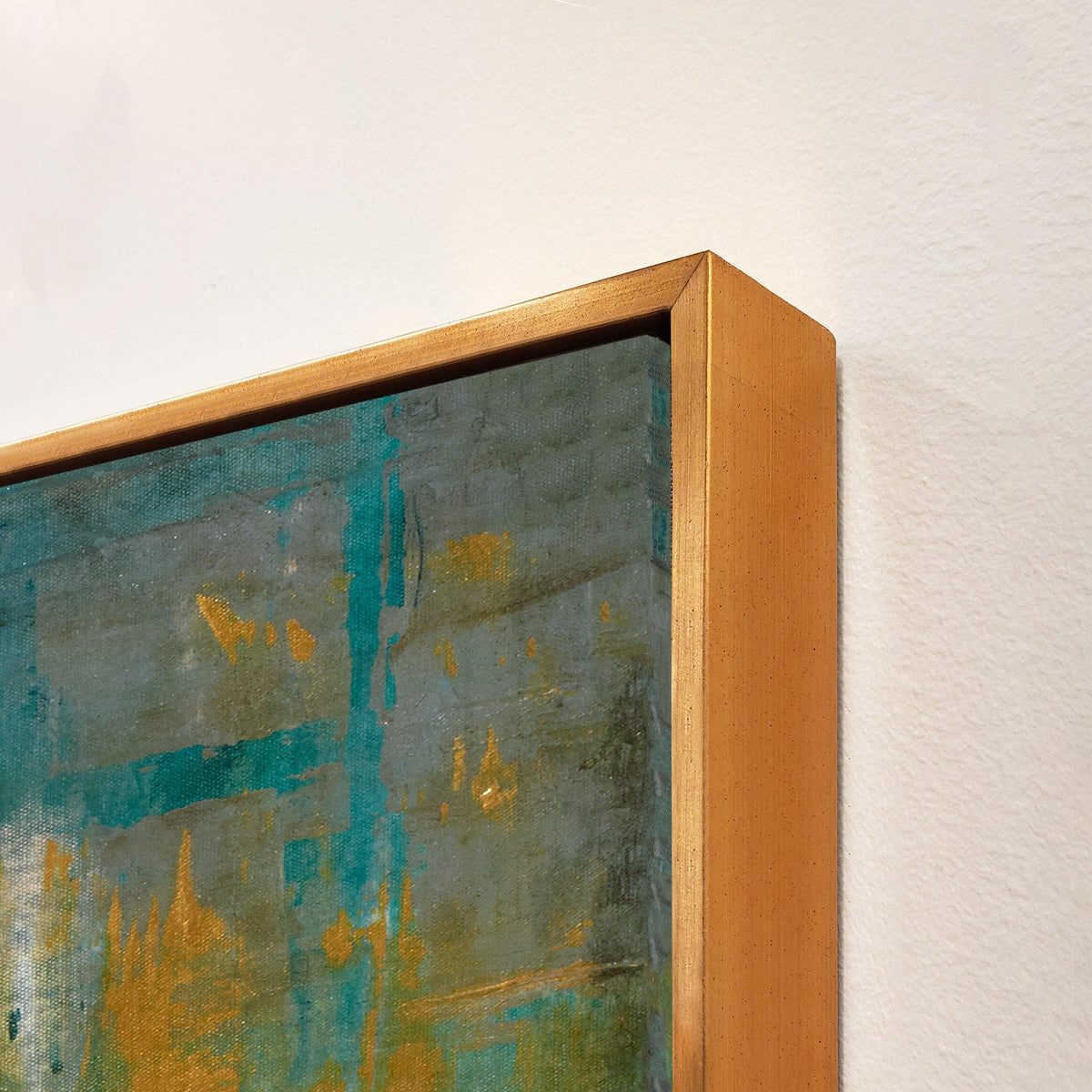 Abstract giclee canvas painting with teal, gold, and gray hues, framed in a gold gallery wrap.
