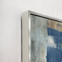 Abstract giclee canvas painting with blue and gray tones, framed in a sleek silver floating frame.