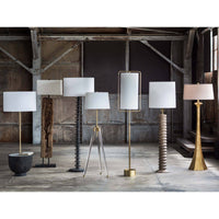 Theo Floor Lamp Ebony with alabaster top, ebony birch wood, and brass accents, featuring a white linen shade.