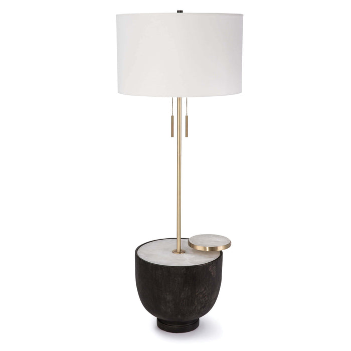 Theo Floor Lamp with ebony birch wood base, alabaster top, brass accents, and a white linen shade.