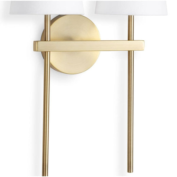 Toni Sconce Double: natural brass, double-armed sconce with two white linen shades.