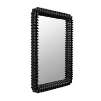 Toshi Mirror: Black hardwood wall mirror with hand-carved ribbed frame, rounded rectangular, industrial style.