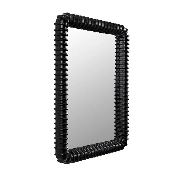 Toshi Mirror: Black hardwood wall mirror with hand-carved ribbed frame, rounded rectangular, industrial style.