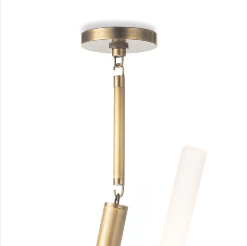 Traveler Chandelier in natural brass, featuring a modern, branching design with frosted acrylic bulb covers.