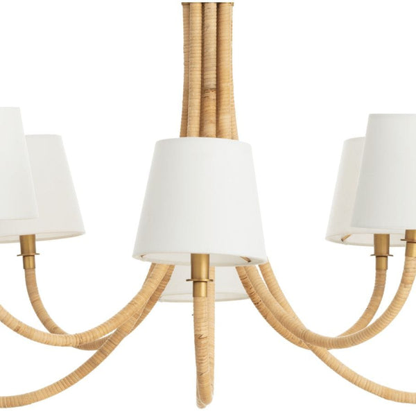 Coastal Treble Chandelier with natural bamboo-wrapped bent arms, polished brass accents, and white linen shades.