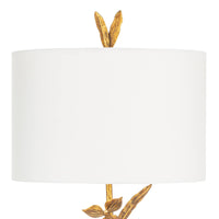 Trillium buffet lamp with antique gold leaf branches, natural linen drum shade, and matching leaf finial.